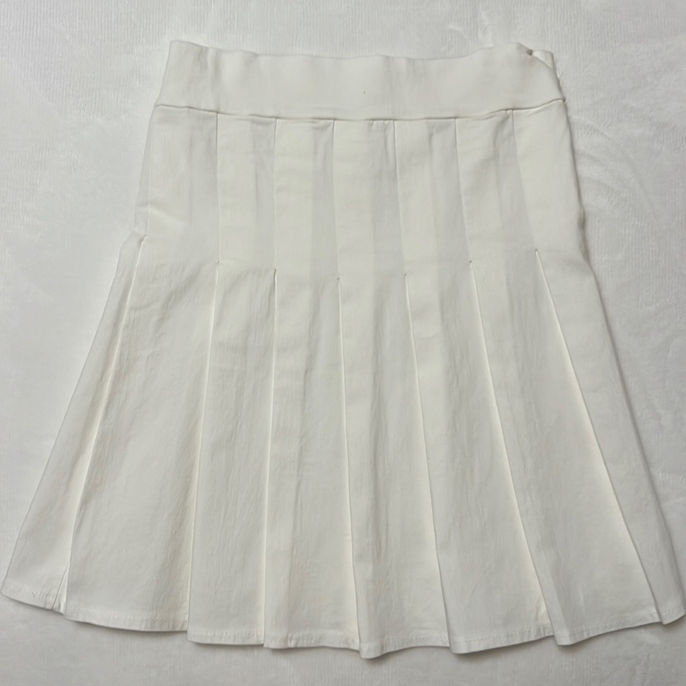 Small white pleated skirt